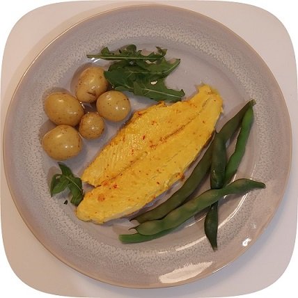 fish dish with olives and green beans